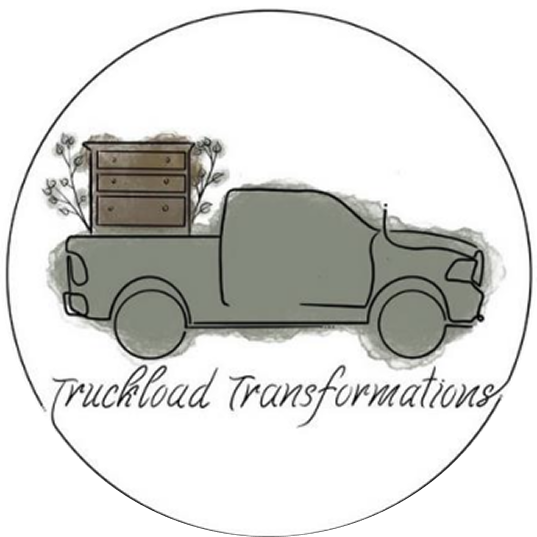 Gray truck with furniture, text below.