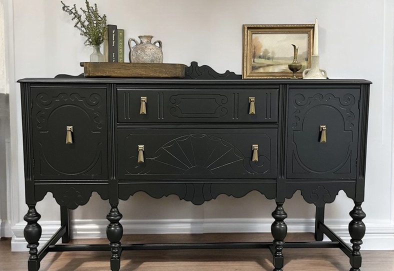 image 39 A black painted buffet with gold handles and knobs.