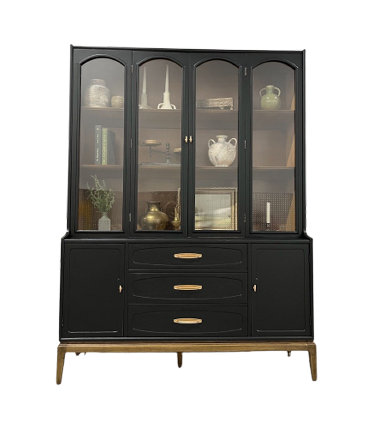 A black and gold china cabinet with glass doors.