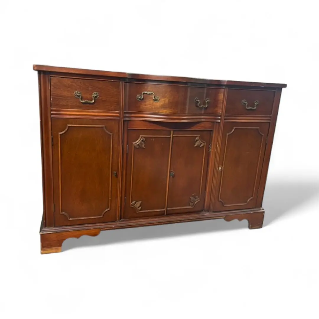Wooden sideboard with drawers and cabinets.